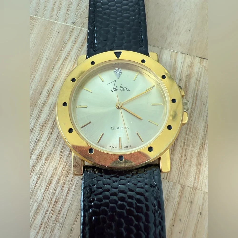 Vintage John weitz gold tone black leather watch NEW BATTERY